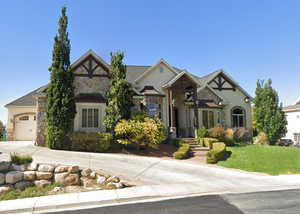 View of front of home with a garage