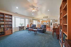 Family room and kitchen/dining great room with vaulted ceilings