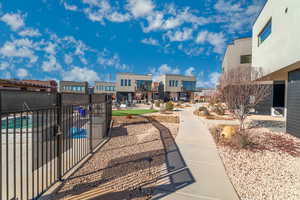 View of property's community with a swimming pool