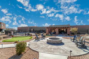 View of patio / terrace with an outdoor fire pit