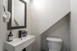 Bathroom with sink and toilet