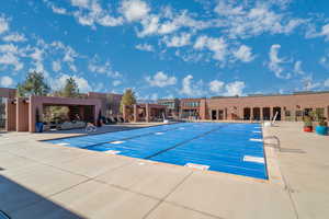 View of swimming pool featuring a patio area