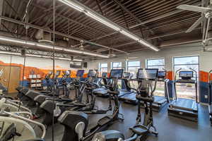 Exercise room featuring ceiling fan