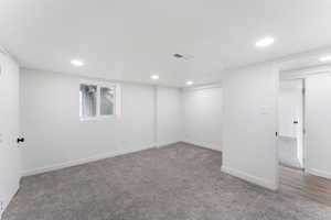 Basement with carpet flooring