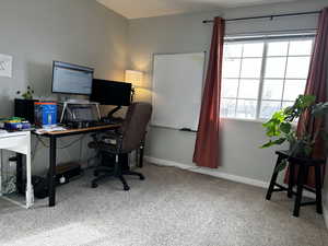 Office area featuring carpet