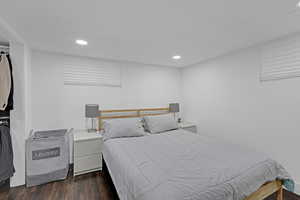 Bedroom featuring dark wood-type flooring