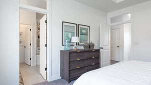 Bedroom featuring light tile patterned floors