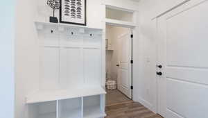 Mudroom with light wood-type flooring