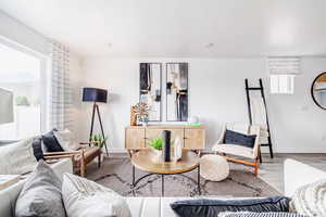 Living room with hardwood / wood-style floors