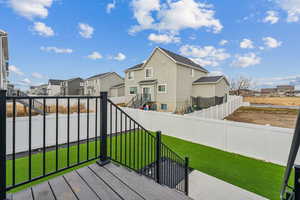 Wooden deck with a lawn