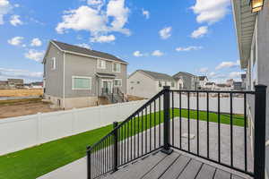 Wooden terrace with a lawn