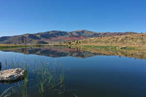 Property view of water with a mountain view