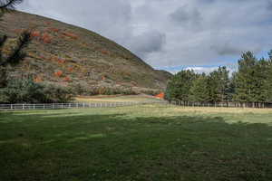 View of mountain feature with a rural view