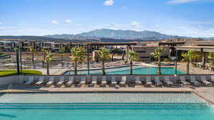 View of pool featuring a patio and a mountain view