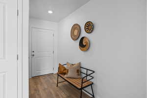 Hallway featuring dark hardwood / wood-style flooring