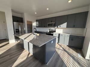 Kitchen with Stainless Steel Refrigerator