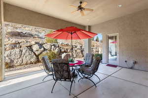 View of patio with ceiling fan