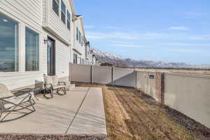 View of patio with a mountain view