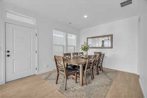 Dining room featuring light wood-type flooring