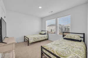 View of carpeted bedroom