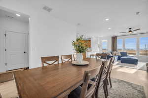 Dining space featuring ceiling fan