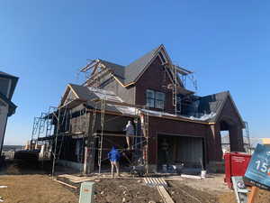 View of front facade with a garage