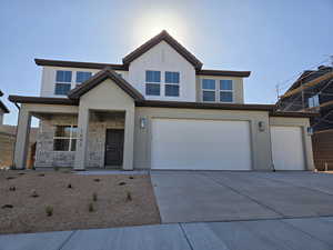 View of front of house with a garage