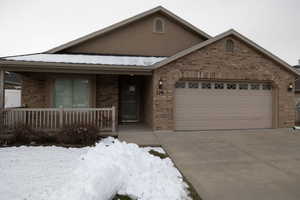 Ranch-style house with a garage