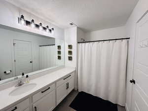 Upstairs Hall Bathroom with oversized vanity and new LED lights