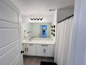 Upstairs Hall Bathroom with oversized vanity and new LED lights