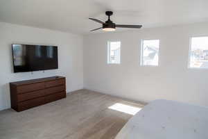 Master Bedroom.  Roller shades included. TV, dresser, bed can be included