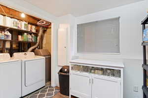 Laundry room featuring separate washer and dryer