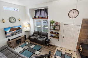 Living room with light wood-type flooring