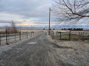 View of road featuring a rural view and a mountain view