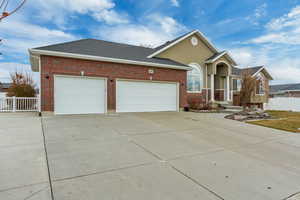 Rambler-style home with a 3-car garage