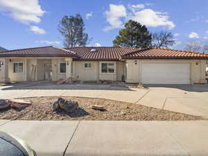 View of front of house with a garage