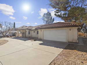 View of front of home with a garage