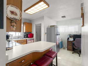 View to back door and laundry closet.