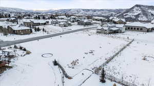 Snowy aerial view with a mountain view