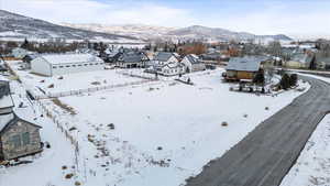 Snowy aerial view with a mountain view