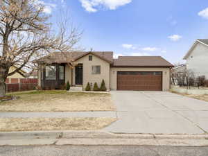 View of front of home with a garage