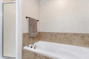 Primary Bathroom upstairs. with independent shower and bath