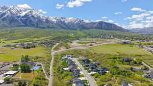 Aerial perspective of suburban area featuring mountains