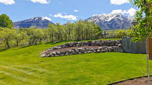 View of yard with a mountain view