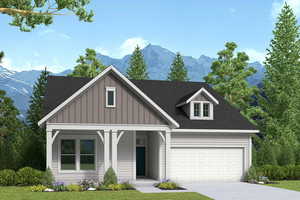 View of front of property featuring a garage and a mountain view.  Pick your own exterior colors! Photo of Finland Model Home not subject property