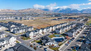 Birds eye view of property with a mountain view