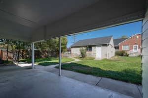 View of patio with an outdoor structure