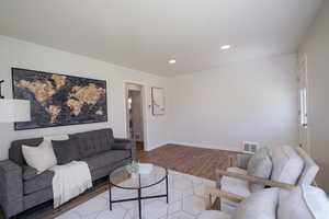 Living room featuring hardwood / wood-style flooring