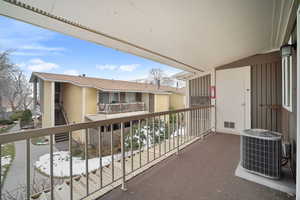 Balcony with central AC unit