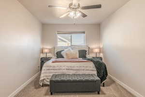 Master bedroom view 2 Carpeted bedroom featuring ceiling fan